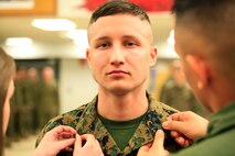 Manhattan, Kan.-native Gunnar A. Naughton, a team member with the Identification and Detection Platoon (IDP), Reaction Force Company, Chemical Biological Incident Response Force (CBIRF), U.S. Marine Forces Command (MARFORCOM),  is meritoriously promoted the rank of corporal during a battalion formation at Naval Support Facility Indian Head, Md., Mar. 2, 2016.
In the Marine Corps, the rank of corporal is the first noncommissioned officer level rank, and corporals have a responsibility to their subordinates and superiors unlike any other. Naughton competed against three other CBIRF Marines on a meritorious board of his superiors to be selected for this promotion. On a meritorious board, Marines are selected based on multiple factors including physical fitness, military appearance and Marine Corps Knowledge in order to assess whether the Marine is ready to take on the responsibilities and duties of a higher grade. (Official USMC Photos by Sgt. Jonathan S. Herrera/Released)
