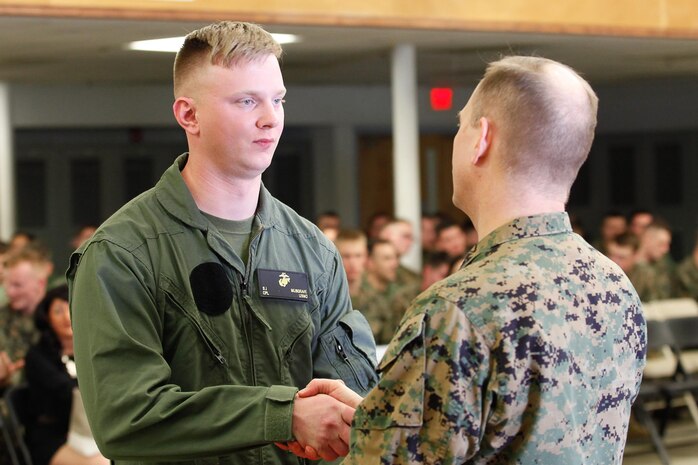 Galion, Ohio-native Cpl. Stephen J. Musgrave, infantryman, left, shakes hands with Col. Steve E. Redifer, commanding officer of the Chemical Biological Incident Response Force (CBIRF), U.S. Marine Corps Force Command (MARFORCOM), during a CBIRF Basic Operations Course graduation ceremony at Naval Support Facility Indian Head, Md., Mar. 11, 2016. The course is a three-week program that provides approximately 145 hours of classroom, practical applications and individual and team testing in chemical, biological, radiological, nuclear, and high-yield explosive (CBRNE) disciplines that meet federal requirements. After graduating the course, each Marine and sailor will be qualified to enter a contaminated area, search the area, provide emergency first aid and provide assistance to nonambulatory patients. Regardless of their jobs, or military occupational specialty, every Marine and sailor with CBIRF is required to complete the course, making the unit uniquely qualified to respond with minimal warning to a CBRNE threat. (Official USMC Photos by Sgt. Jonathan S. Herrera/Released)

