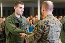 Marietta, Ga.-native Sgt. Benjamin D. Frazier, chemical, biological, radiological, and nuclear (CBRN) defense specialist, left, shakes hands with Col. Steve E. Redifer, commanding officer of the Chemical Biological Incident Response Force (CBIRF), U.S. Marine Corps Force Command (MARFORCOM), during a CBIRF Basic Operations Course graduation ceremony at Naval Support Facility Indian Head, Md., Mar. 11, 2016. The course is a three-week program that provides approximately 145 hours of classroom, practical applications and individual and team testing in chemical, biological, radiological, nuclear, and high-yield explosive (CBRNE) disciplines that meet federal requirements. After graduating the course, each Marine and sailor will be qualified to enter a contaminated area, search the area, provide emergency first aid and provide assistance to nonambulatory patients. Regardless of their jobs, or military occupational specialty, every Marine and sailor with CBIRF is required to complete the course, making the unit uniquely qualified to respond with minimal warning to a CBRNE threat. (Official USMC Photos by Sgt. Jonathan S. Herrera/Released)
