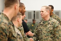 Col. Steve E. Redifer, right, commanding officer of the Chemical Biological Incident Response Force (CBIRF), U.S. Marine Corps Force Command (MARFORCOM), thanks the Marine and Civilian instructors of the Downey Responder Training Facility following a  CBIRF Basic Operations Coursegraduation ceremony at Naval Support Facility Indian Head, Md., Mar. 11, 2016. The course is a three-week program that provides approximately 145 hours of classroom, practical applications and individual and team testing in chemical, biological, radiological, nuclear, and high-yield explosive (CBRNE) disciplines that meet federal requirements. After graduating the course, each Marine and sailor will be qualified to enter a contaminated area, search the area, provide emergency first aid and provide assistance to nonambulatory patients. Regardless of their jobs, or military occupational specialty, every Marine and sailor with CBIRF is required to complete the course, making the unit uniquely qualified to respond with minimal warning to a CBRNE threat. (Official USMC Photos by Sgt. Jonathan S. Herrera/Released)