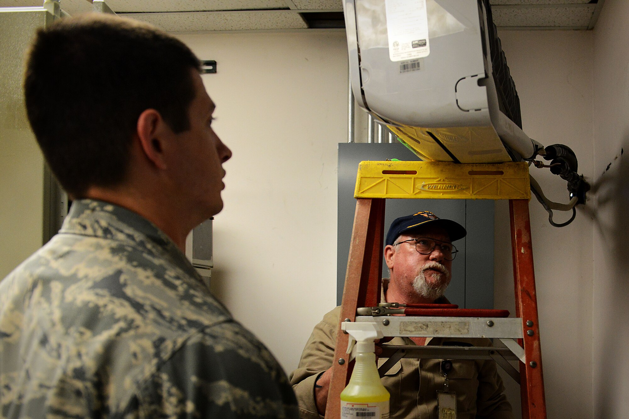 U.S. Air Force Senior Airman Darek Vetter and Louis Lorick, 20th Civil Engineer Squadron heating, ventilation, and air conditioning technicians, remove a heating and air conditioning evaporator to find a leak at the 20th Equipment Maintenance Squadron at Shaw Air Force Base, S.C., March 28, 2016. The technicians used a variety of tools including regulators, nitrogen, and soap bubbles to determine exactly where the leak was located, which was releasing refrigerant. (U.S. Air Force photo by Airman 1st Class Destinee Dougherty)