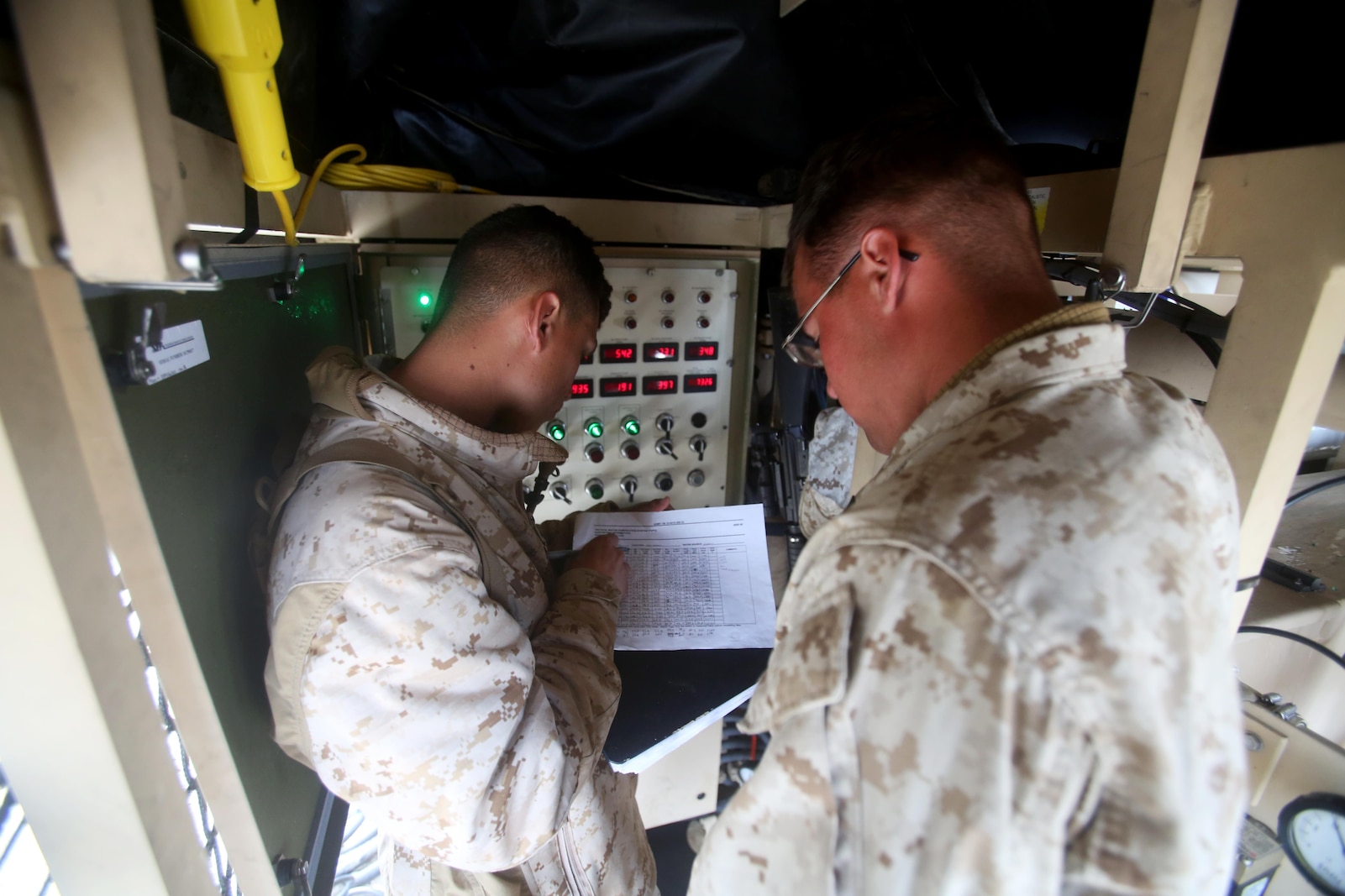Private First Class Daniel Bonilla and Lance Cpl. Tyler Schneider, both water support technicians with Utilities Platoon, Headquarters and Support Company, 7th Engineer Support Battalion, 1st Marine Logistics Group, operate a tactical water purification system during a utilities exercise at Red Beach aboard Camp Pendleton, Calif., March 21, 2016. Utilities Platoon conducted an eight-day field exercise which focused on their ability to provide clean water and stable power to a unit located in an environment without standard utility resources. (U.S. Marine Corps photo by Cpl. Carson Gramley/released)