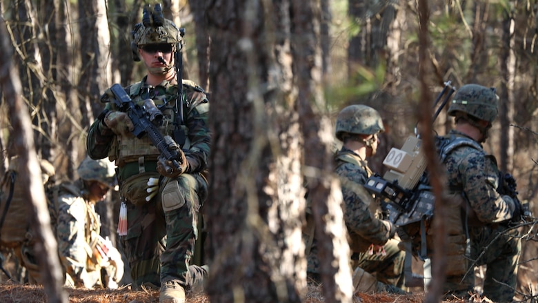 Marines Raiders from Company F, 2d Marine Raider Battalion, led a simulated partner nation force on ground combat patrolling tactics, techniques  and procedures during a Company Collective Exercise in Fort Bragg, South Carolina, Feb. 28, 2016. The Marine Special Operations Company and individual teams where tested on their execution of basic skills as well as learned and honed new tactic, techniques and procedures.