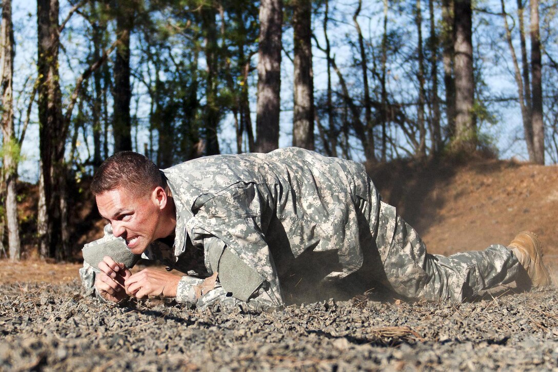 Army Sgt. 1st Class Joshua Moeller maneuvers through an obstacle course as part of the Best Warrior competition for the 108th Training Command at Fort Jackson, S.C., March 23, 2016. This year's competition will determine the top noncommissioned officer and junior enlisted soldier who will represent the command in the Army Reserve Best Warrior competition later this year at Fort Bragg, N.C. Army photo by Maj. Michelle Lunato
