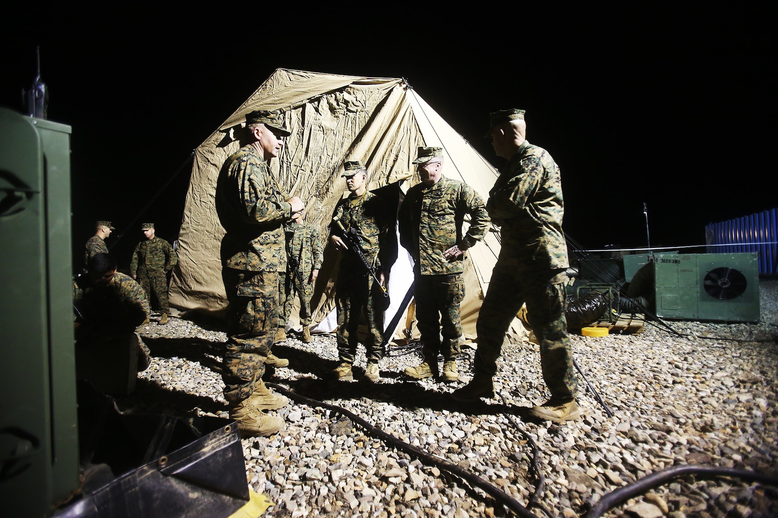 U.S. Marines Lt. Gen. David H. Berger and Sgt. Maj. Bradley Kasal learn about water purification during a cold weather training exercise at the Mountain Warfare Training Center in Bridgeport, Calif., March 17, 2016. Berger is the commanding general and Kasal is the sergeant major of I Marine Expeditionary Force. Approximately 90 Marines with 7th Engineer Support Battalion, 1st Marine Logistics Group, served as the logistics combat element in support of 2nd Battalion, 4th Marine Regiment, 1st Marine Division, during Mountain Exercise 6-16, Feb. 24- March 26, 2016. (U.S. Marine Corps photo by Sgt. Laura Gauna/released)