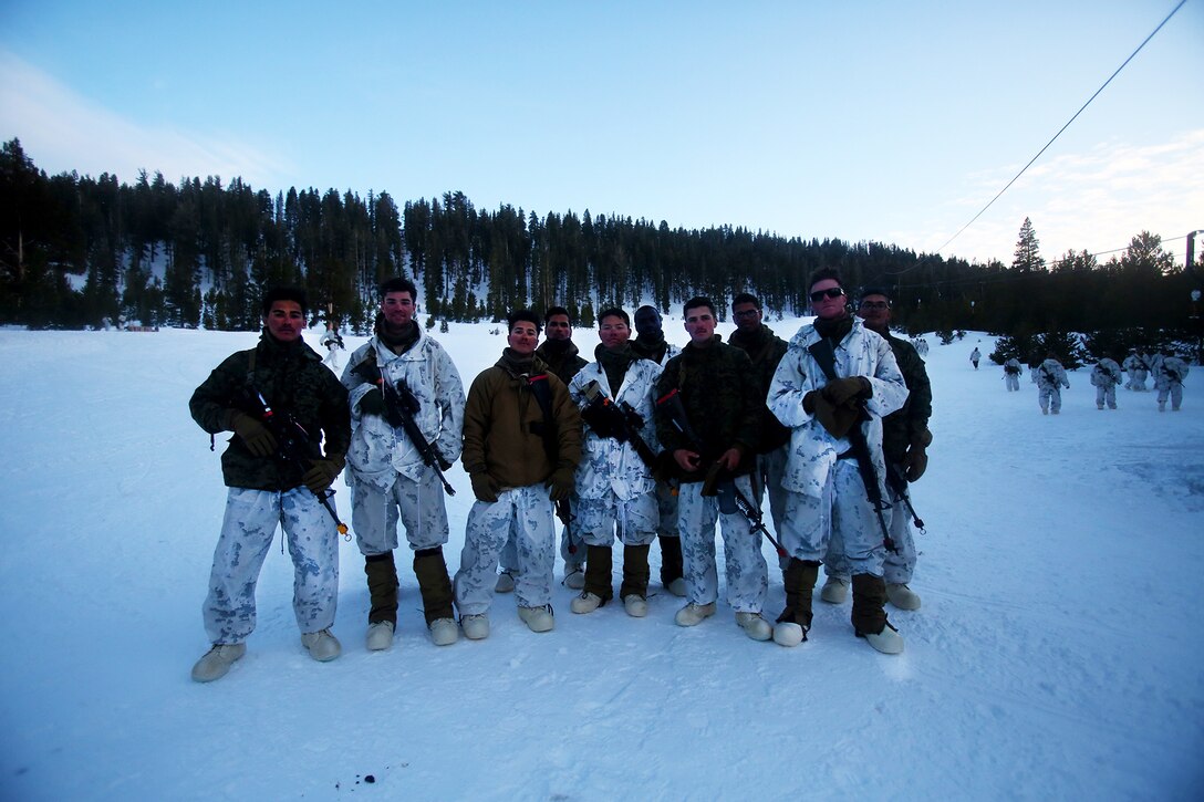 Marines pose for a photo during a cold weather training exercise at the Mountain Warfare Training Center in Bridgeport, Calif., March 16, 2016. The Marines, combat engineers with 7th Engineer Support Battalion, 1st Marine Logistics Group, were among 90 Marines with 7th ESB who served as the logistics combat element in support of 2nd Battalion, 4th Marine Regiment, 1st Marine Division, during Mountain Exercise 6-16, Feb. 24- March 26, 2016. The Battalion integrated 18 combat engineers with the infantrymen conducting the exercise. (U.S. Marine Corps photo by Sgt. Laura Gauna/released)