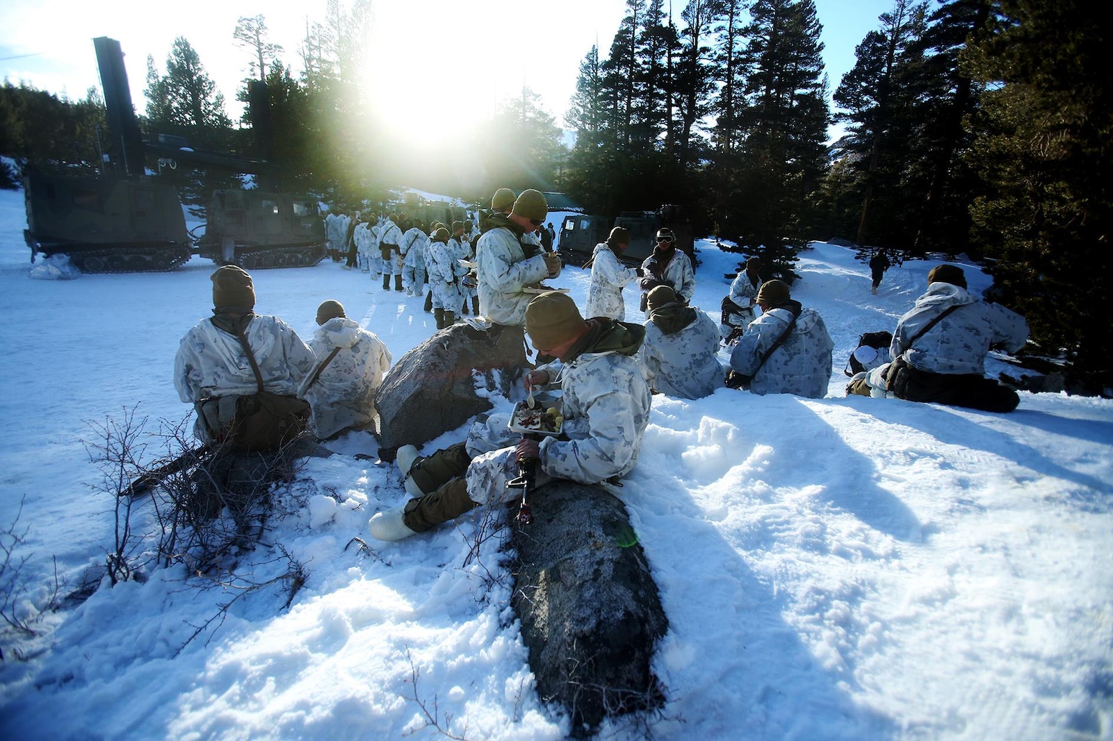 Marines eat warm food during a cold weather training exercise at the Mountain Warfare Training Center in Bridgeport, Calif., March 16, 2016. The Marines, combat engineers with 7th Engineer Support Battalion, 1st Marine Logistics Group, were among 90 Marines with 7th ESB who served as the logistics combat element in support of 2nd Battalion, 4th Marine Regiment, 1st Marine Division, during Mountain Exercise 6-16, Feb. 24- March 26, 2016. The Battalion integrated 18 combat engineers with the infantrymen conducting the exercise. (U.S. Marine Corps photo by Sgt. Laura Gauna/released)