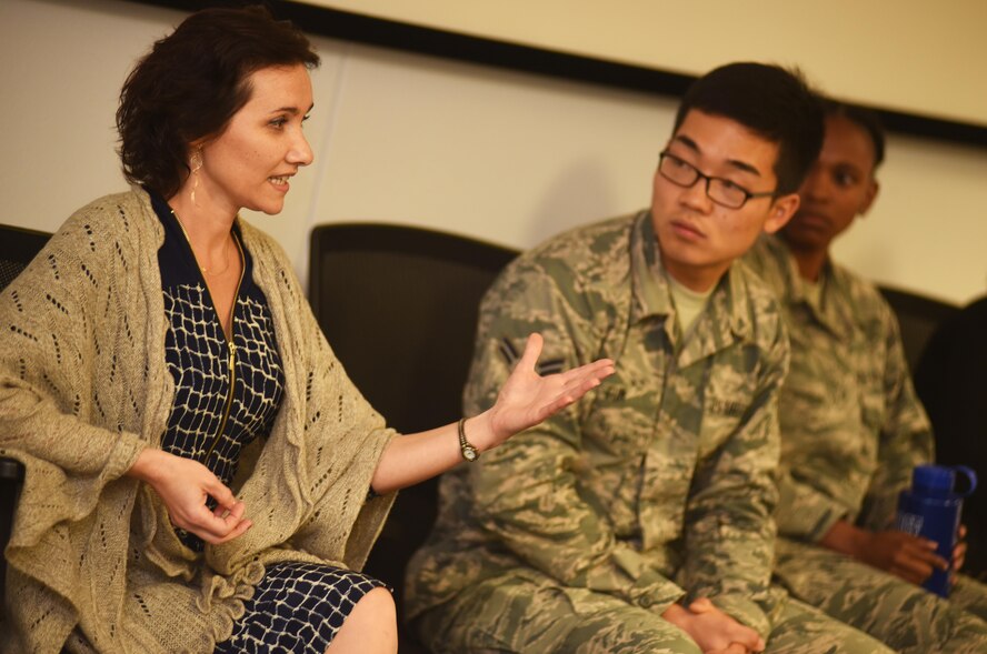 Aleksandra Churinov, United States Air Force Special Operations School Russian language instructor, explains differences between American and Russian norms during a course on Hurlburt Field, Fla., March 31, 2016. Airmen 1st Class Woo Jin Eum and Naomi Muhura, USAFSOS language and culture advisors, also shared their experiences. (U.S. Air Force photo by Staff Sgt. Melanie Holochwost) 
