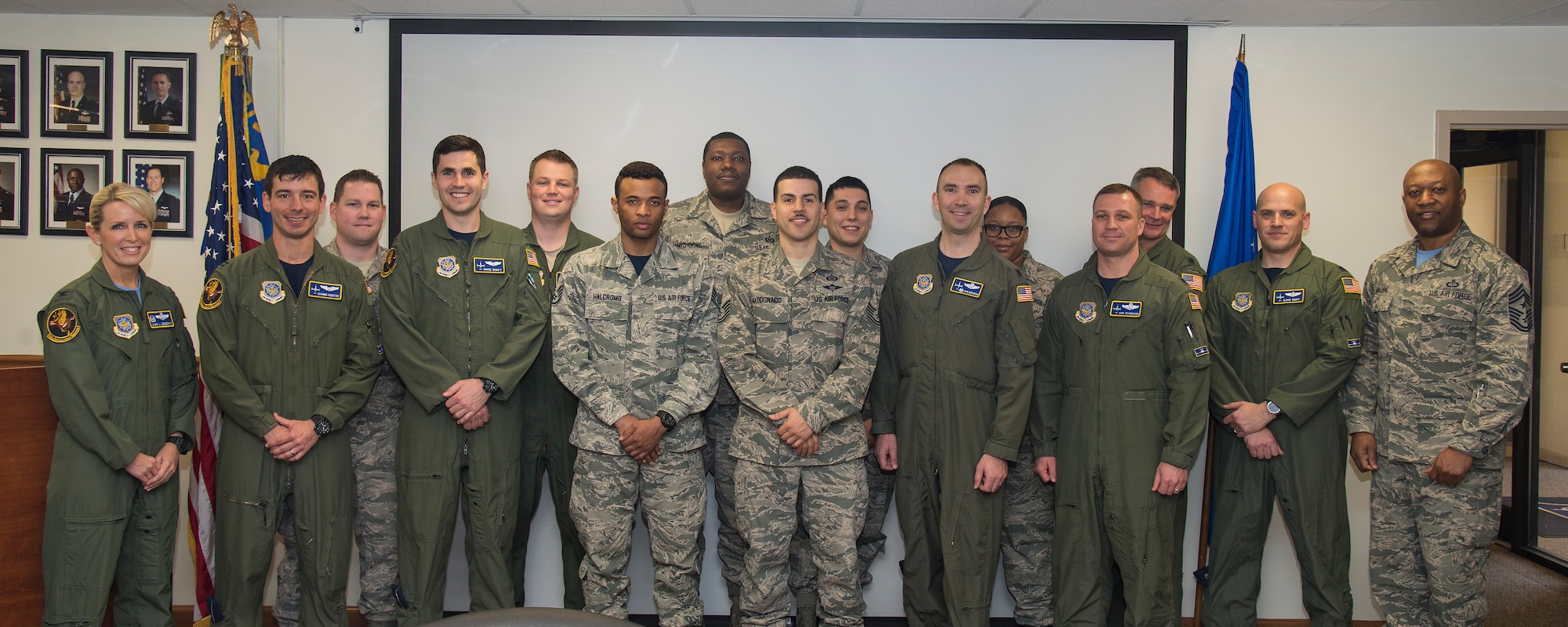 Col. Laura Lenderman, 375th Air Mobility Wing commander, far left, and Chief Master Sgt. Wesley Mathias, far right, 375th AMW Command Chief, met with personnel from the 457th Airlift Squadron at Joint Base Andrews, Maryland, March 18, 2016. Members of the 457th AS perform DV airlift missions within the United States as well as for deployed missions serving U.S. Central Command and U.S. Southern Command, and when demand exceeds the 89th Airlift Wing’s capacity, they also support diplomatic effors of cabinet members and other high-ranking U.S. government dignitaries. (U.S. Air Force photo/Airman Daniel Garcia)