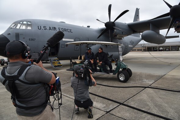 The Golf Channel covers PGA golfers Esteban Toledo's and Rocco Mediate's visit to the 403rd Wing, Keesler Air Force Base, Mississippi. The golfers flew aboard a WC-130J Super Hercules aircraft with an 815th Airlift Squadron crew March 30, 2106. The golfers, who are playing in the Mississippi Gulf Resort Classic, received a 53rd Weather Reconnaissance Squadron Hurricane Hunter brief before their flight March 30, 2016. (U.S. Air Force photo/Maj. Marnee A.C. Losurdo)