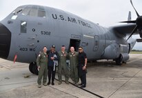 An 815th Airlift Squadron aircrew flew PGA golfers Esteban Toledo and Rocco Mediate aboard a WC-130J Super Hercules aircraft March 30, 2016. The golfers, who are playing in the Mississippi Gulf Resort Classic, received a 53rd Weather Reconnaissance Squadron Hurricane Hunter brief before their flight March 30, 2016. (U.S. Air Force photo/Maj. Marnee A.C. Losurdo)