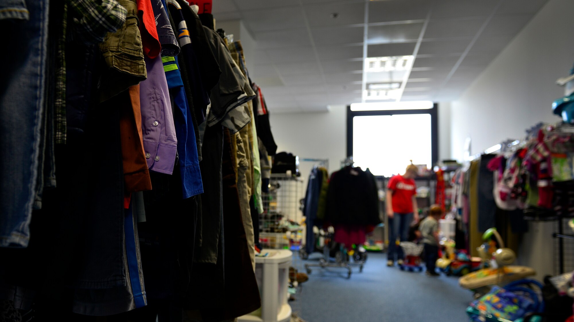 Shoppers walk through the Aviano Thrift Shop, March 29, 2016, at Aviano Air Base, Italy. The money earned is used for scholarships, base-wide fundraisers and financial support for families in need. (U.S. Air Force photo by Airman 1st Class Cary Smith/Released)  