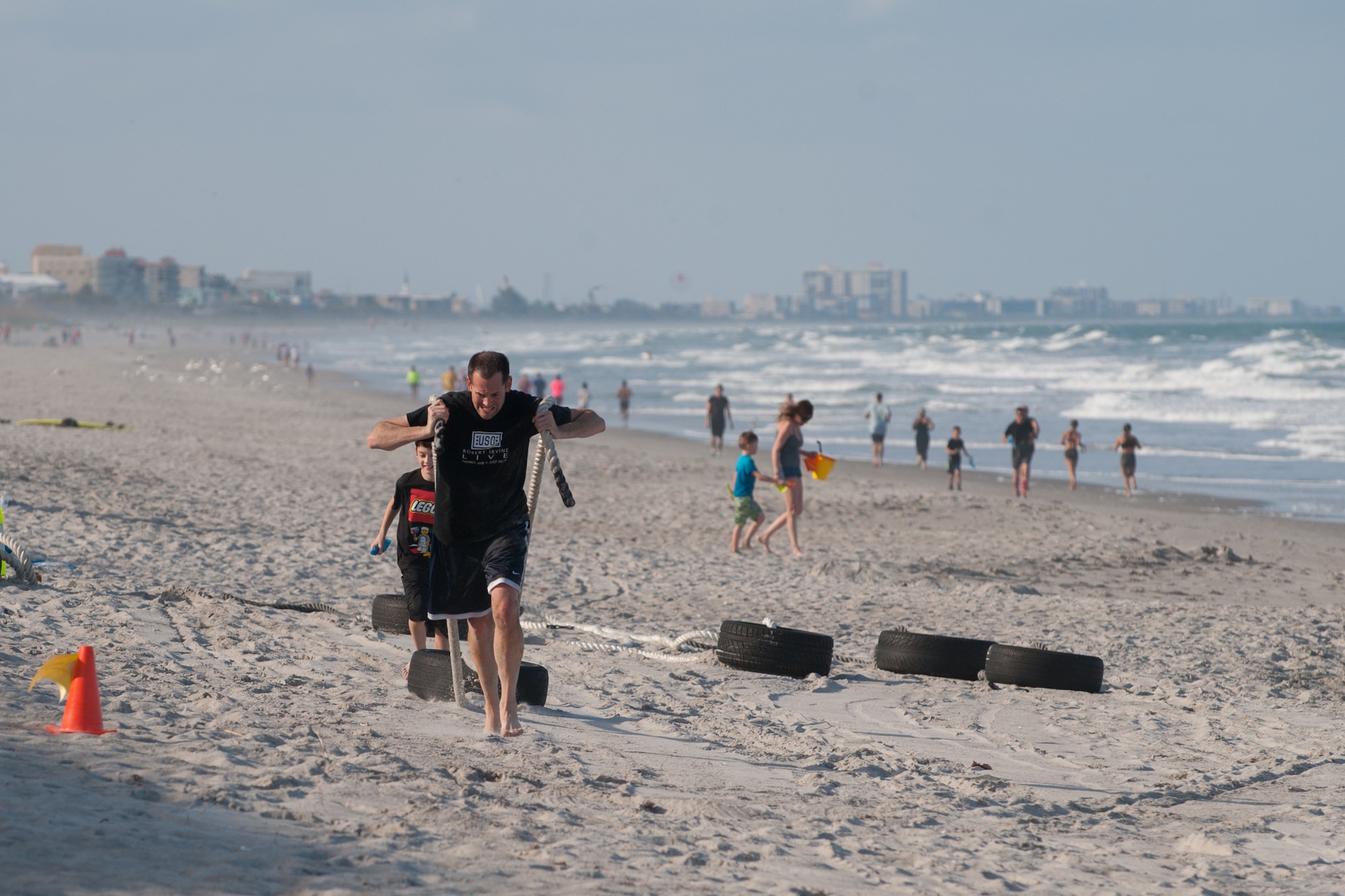 Members here participated in an Obstacle Mudd Race, March 30, 2016, at the Beach House at Patrick Air Force Base, Fla. The 45th Force Support Squadron Run Series included two-person teams, in which they ran, crawled, and climbed their way to the finish line. (U.S. Air Force photos/Benjamin Thacker) (Released) 