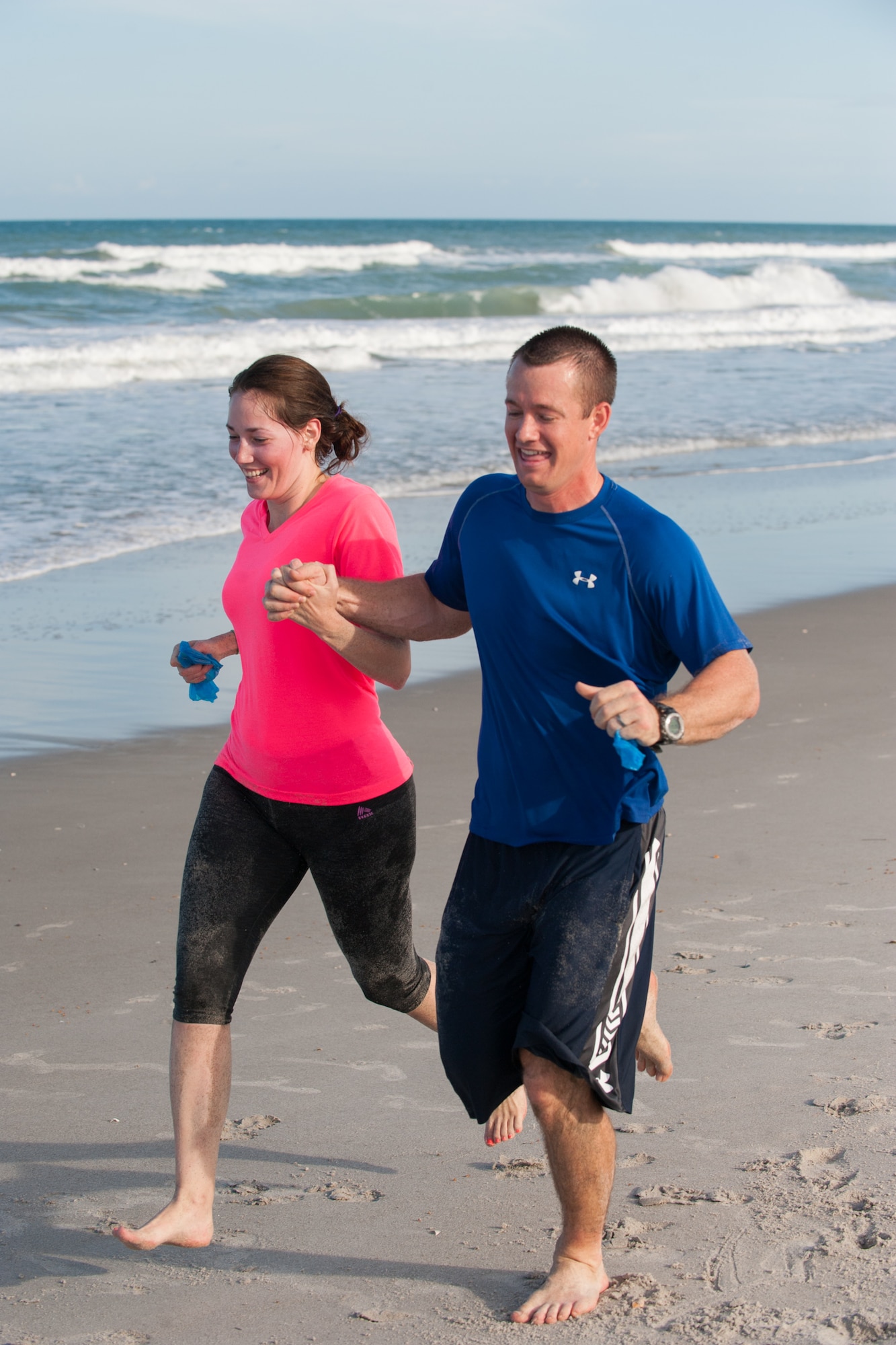 Members here participated in an Obstacle Mudd Race, March 30, 2016, at the Beach House at Patrick Air Force Base, Fla. The 45th Force Support Squadron Run Series included two-person teams, in which they ran, crawled, and climbed their way to the finish line. (U.S. Air Force photos/Benjamin Thacker) (Released) 