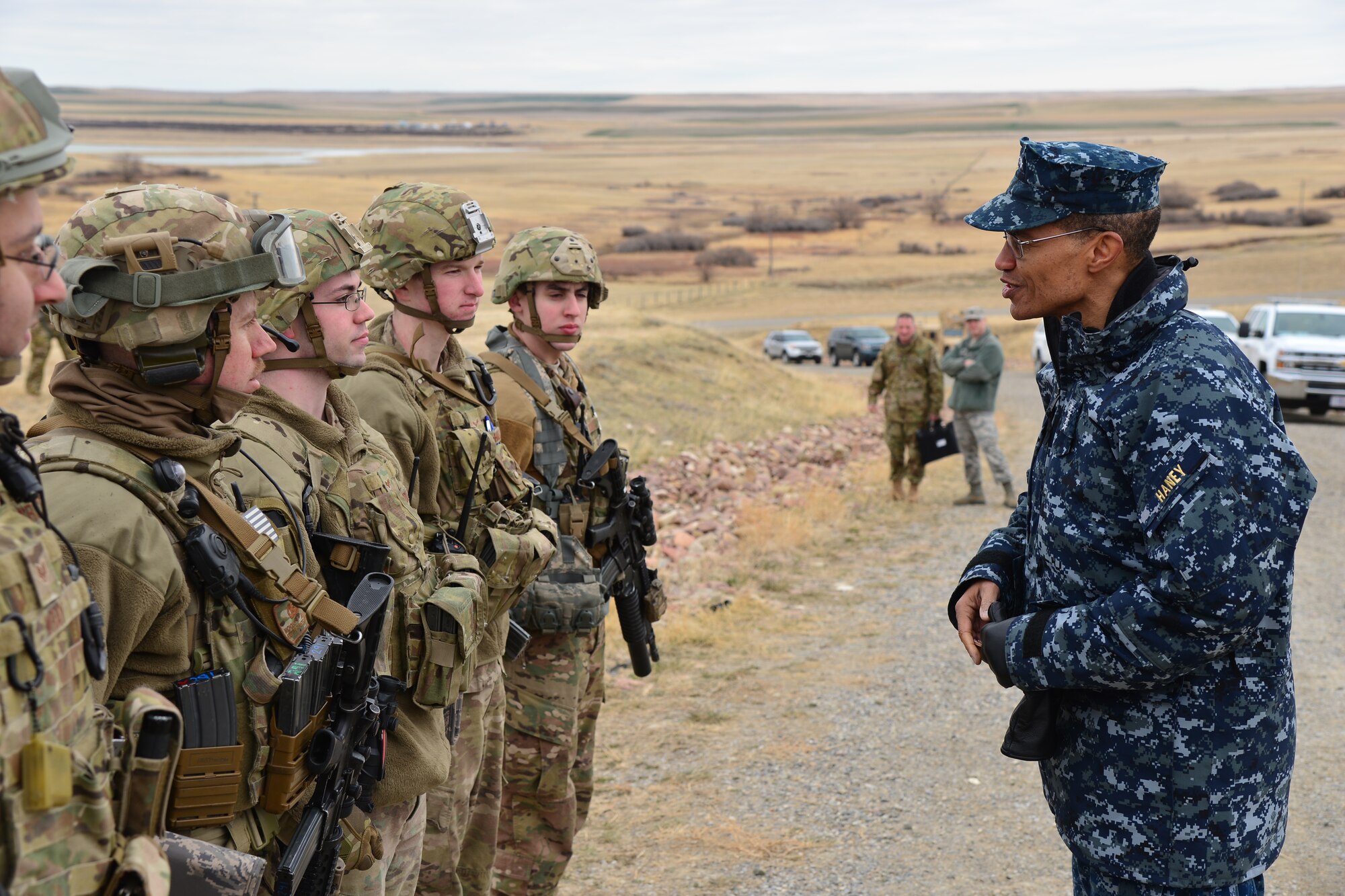 U.S. Navy Adm. Cecil D. Haney, U.S. Strategic Command (USSTRATCOM) commander (right), speaks to security forces Airmen from the 341st Missile Wing during his visit to an intercontinental ballistic missile (ICBM) launch facility near Malmstrom Air Force Base, Mont., March 30, 2016. While there, Haney and Mr. David G. Brown (not pictured), Strategic Command Consultation (SCC) Committee member, presented the 2015 Omaha Trophy, ICBM category, to U.S. Air Force Col. John T. Wilcox II, 341st Missile Wing commander (not pictured) and Team Malmstrom, in recognition of the wing's contributions to USSTRATCOM's global strategic missions. The Omaha Trophy, which dates back to the U.S. Air Force's Strategic Air Command, was originally created by the SCC in 1971. At the time, a single trophy was presented annually as a token of appreciation to USSTRATCOM's best wing. Since then, the tradition has evolved to unit-level awards that recognize the command's premier ICBM wing, ballistic missile submarine, strategic bomber wing and global operations (space/cyberspace) unit. This year, a new category was added to include the combatant command's top strategic aircraft wing. (U.S. Air Force photo by Airman Daniel Brosam)