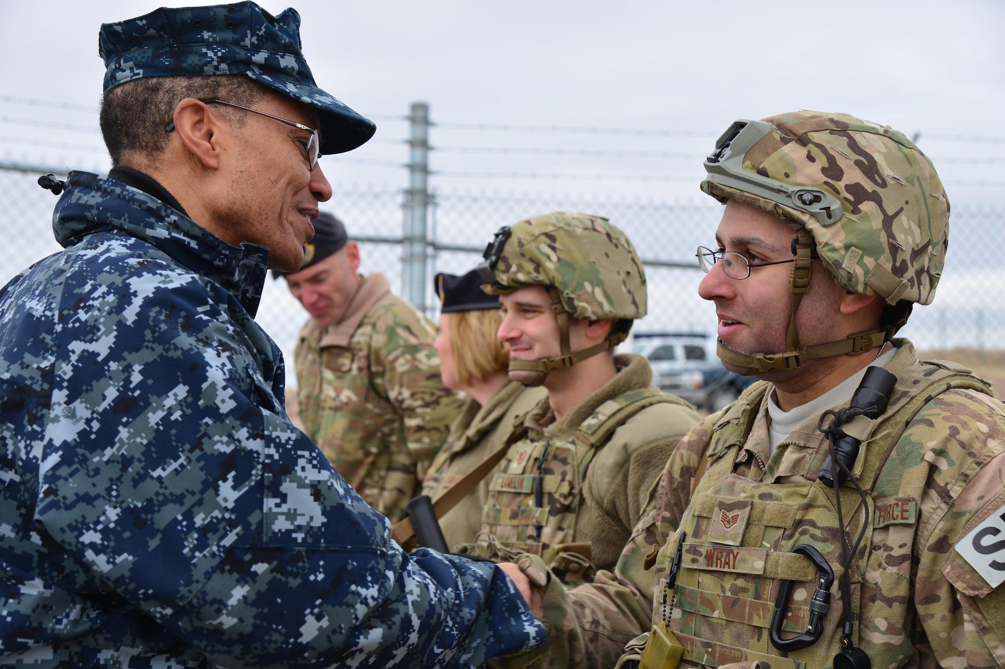 U.S. Navy Adm. Cecil D. Haney, U.S. Strategic Command (USSTRATCOM) commander (left), speaks to a security forces Airman from the 341st Missile Wing during his visit to an intercontinental ballistic missile (ICBM) launch facility near Malmstrom Air Force Base, Mont., March 30, 2016. While there, Haney and Mr. David G. Brown (not pictured), Strategic Command Consultation (SCC) Committee member, presented the 2015 Omaha Trophy, ICBM category, to U.S. Air Force Col. John T. Wilcox II, 341st Missile Wing commander (not pictured) and Team Malmstrom, in recognition of the wing's contributions to USSTRATCOM's global strategic missions. The Omaha Trophy, which dates back to the U.S. Air Force's Strategic Air Command, was originally created by the SCC in 1971. At the time, a single trophy was presented annually as a token of appreciation to USSTRATCOM's best wing. Since then, the tradition has evolved to unit-level awards that recognize the command's premier ICBM wing, ballistic missile submarine, strategic bomber wing and global operations (space/cyberspace) unit. This year, a new category was added to include the combatant command's top strategic aircraft wing. (U.S. Air Force photo by Airman Daniel Brosam)