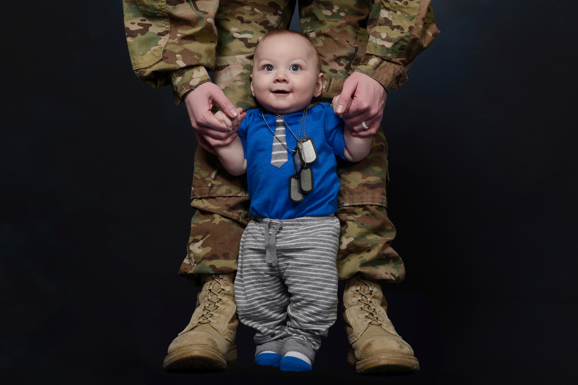 Staff Sgt. Lauren Cerda, 341st Security Forces Support Squadron training instructor, poses with son Preston. In recognition of the well documented, evidence-based health advantages of breast-feeding for both infants and mothers, this progressive stance ensures all women have an adequate space to express breast milk and the opportunity to breast-feed. (U.S. Air Force photo/Staff Sgt. Delia Marchick)