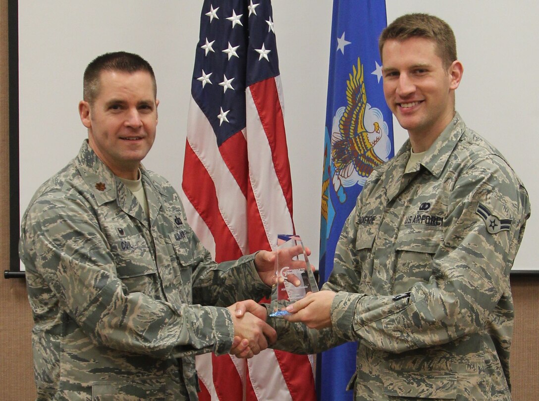 Maj Coil presents A1C Justis MacKenzie with the 2016 AFBF Annual Airman of the Year. Well done, A1C MacKenzie!