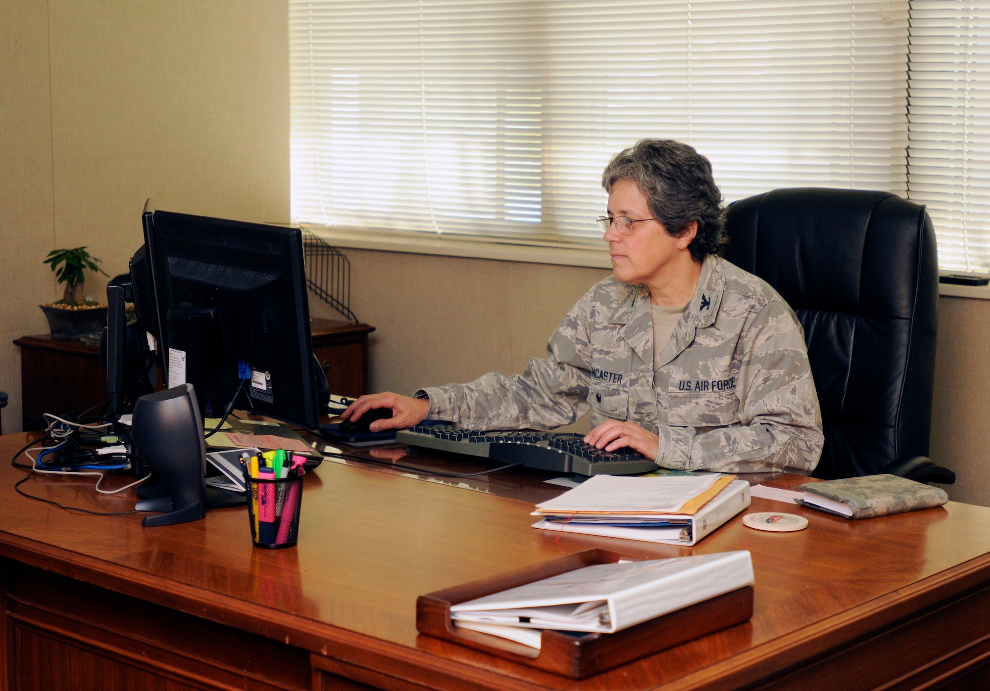 U.S. Air Force Col. Barbara Doncaster, vice commander of the 145th Airlift Wing, reviews the training schedule for the flying mission at the North Carolina Air National Guard Base, Charlotte Douglas International Airport, March 16, 2016. Doncaster is the first female to hold this position in the history of the NCANG. (U.S. Air National Guard photo by Master Sgt. Patricia F. Moran/Released)