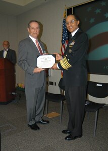 U.S. Navy Adm. Cecil D. Haney, U.S. Strategic Command commander (right), poses for a photo with Mr. Robert A. Tolhurst, outgoing Joint Warfare Analysis Center (JWAC) executive director, during Tolhurstâ€™s retirement ceremony in Dahlgren, Va., March 31, 2016. During the ceremony, Haney thanked Tolhurst for his &ldquo;38 years of faithful service&rdquo; to the nation as a military officer and as a Department of Defense (DoD) civilian leader. The JWAC is a science and engineering institution tasked with solving complex challenges in support of USSTRATCOM and other unified and combatant commands, as well as military services and other government departments and agencies. One of nine DoD unified combatant commands, USSTRATCOM has global strategic missions, assigned through the Unified Command Plan, which include strategic deterrence; space operations; cyberspace operations; joint electronic warfare; global strike; missile defense; intelligence, surveillance and reconnaissance; combating weapons of mass destruction; and analysis and targeting. (Photo courtesy of the Joint Warfare Analysis Center)