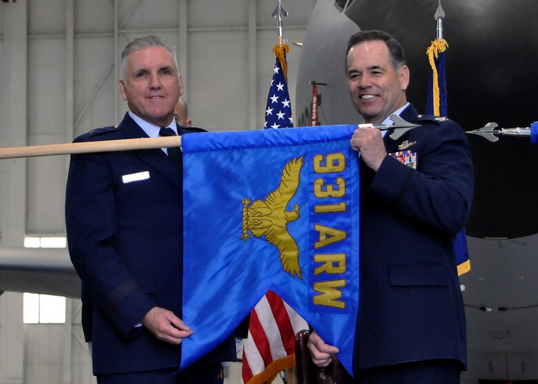 Col. Mark S. Larson, right, 931st Air Refueling Wing commander, salutes Maj. General John C. Flournoy Jr., 4th Air Force commander, during a re-designation ceremony April 30, 2016, at McConnell Air Force Base, Kansas. The 931 ARW, an associate unit of the active-duty 22 ARW, shares responsibilities for aircraft maintenance and flying operations for the largest KC-135 Stratotanker base in the Air Force. (U.S. Air Force photo by Senior Airman Preston Webb)