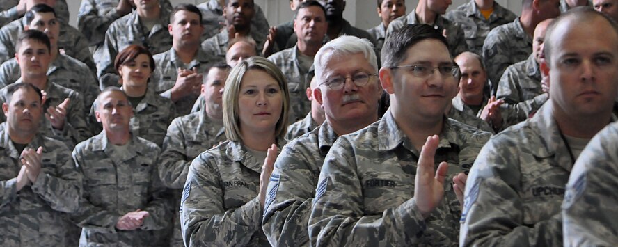 Airmen with the 931st Air Refueling Wing applaud during the 931 ARW re-designation ceremonies April 30, 2016, at McConnell Air Force Base, Kansas. This ceremony serves as an official marker for the re-designation that took place March 5, 2016, when the group became the 931 ARW. (U.S. Air Force photo by Senior Airman Preston Webb)