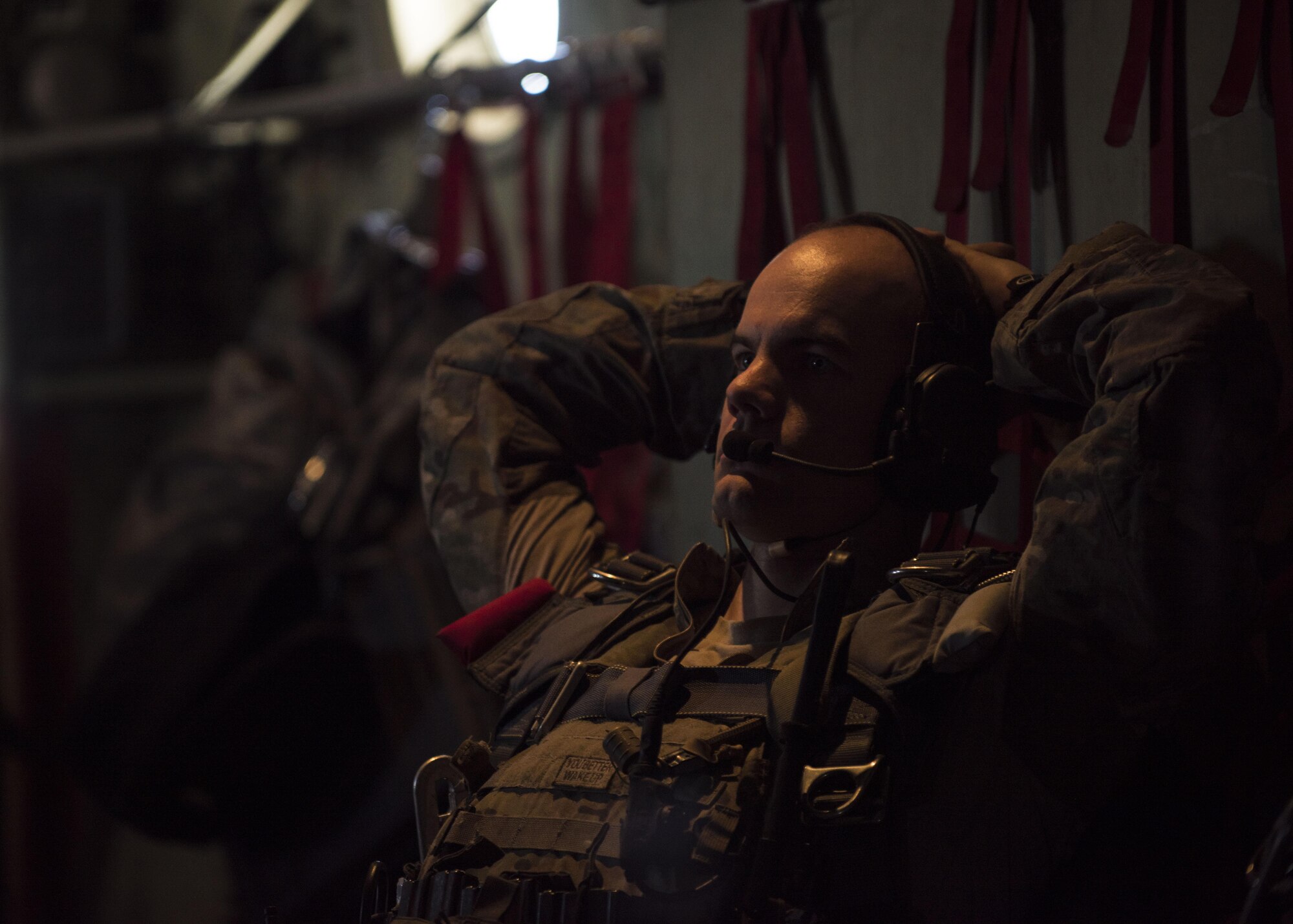 A pararescueman from the 83rd Expeditionary Rescue Squadron prepares himself before parachuting out of a C-130J Super Hercules during a mission rehersal at Bagram Airfield, Afghanistan, April 28, 2016. Members of the 83rd Expeditionary Rescue Sqadron, the last active rescue squadron in Afghanistan, supports Operation Freedom's Sentinel and NATO's Resolute Support Mission. (U.S. Air Force photo by Senior Airman Justyn M. Freeman)
