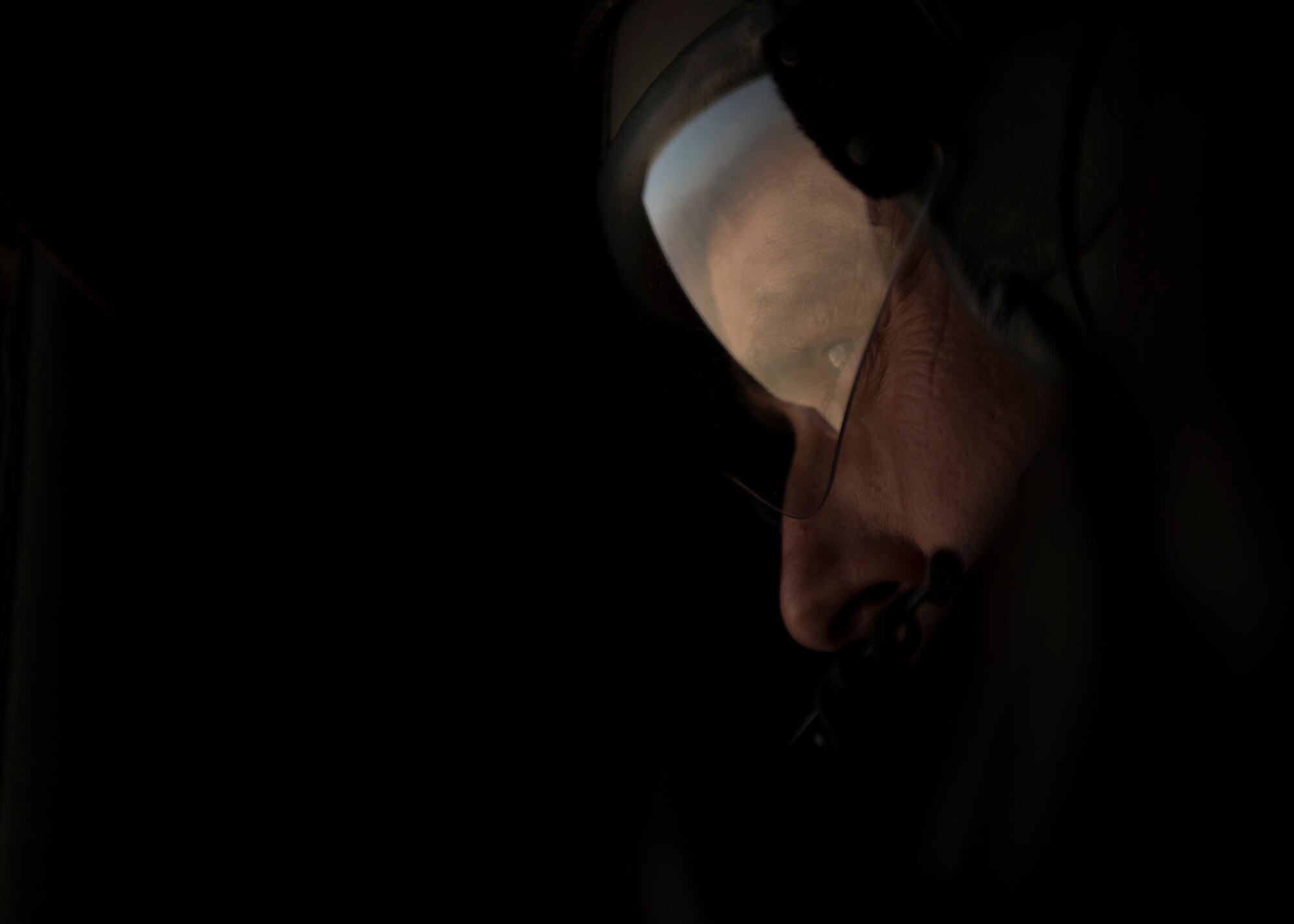 Senior Master Sgt. Kevin Letz, 774th Expeditionary Airlift Squadron loadmaster, keeps an eye out during a pararescuemen jump at Bagram Airfield, Afghanistan, April 28, 2016. The C-130J Super Hercules is used for troop and cargo transport and served as a jump platform for the 83rd Rescue Squadron. (U.S. Air Force photo by Senior Airman Justyn M. Freeman)