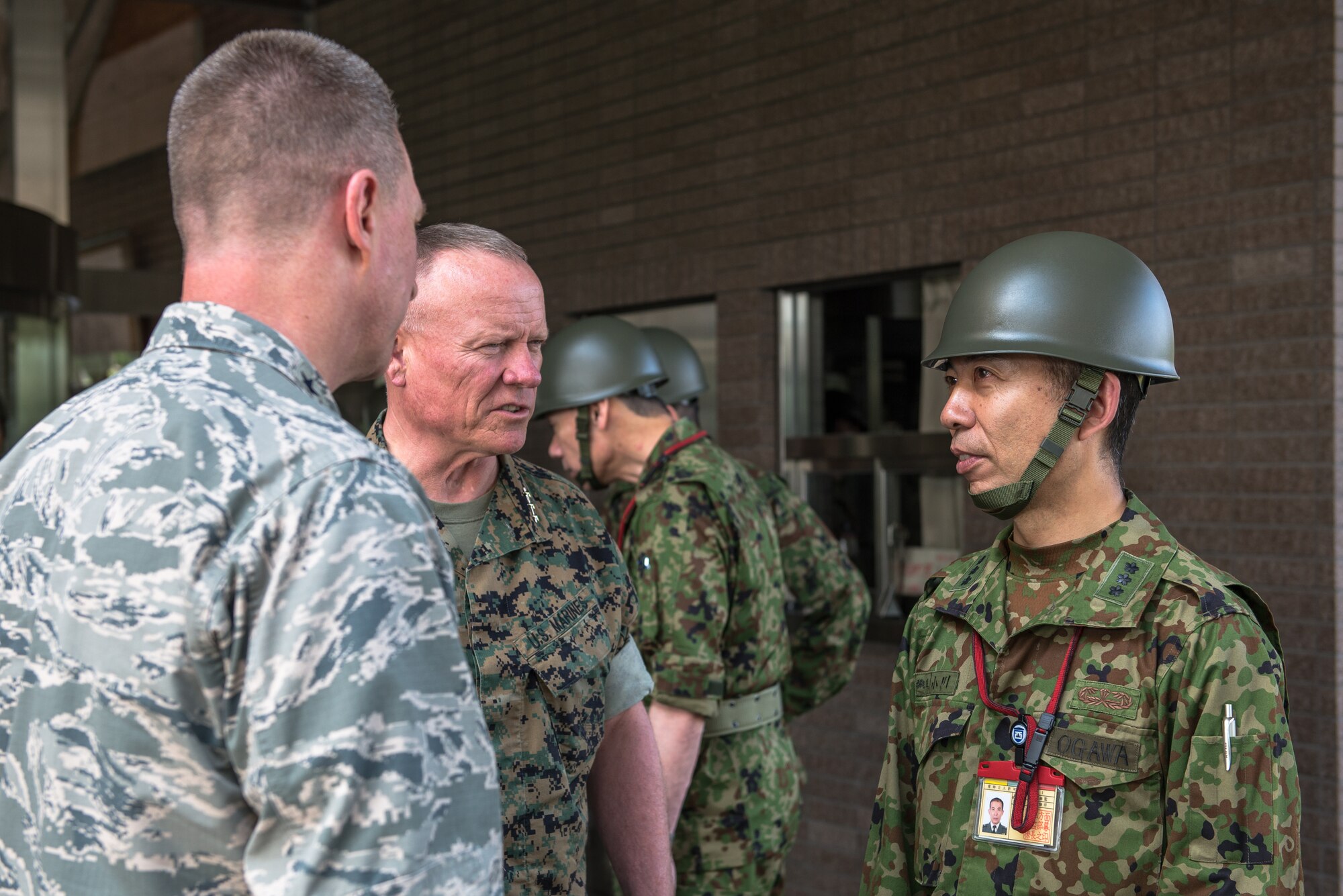 Lt. Gen. Kiyoshi Ogawa, commanding general of the Japanese Ground Self-Defense Force Western Army, discusses earthquake disaster relief actions taking place with Lt. Gen. Lawrence Nicholson, commanding general of III Maine Expeditionary Force, and Lt. Gen. John Dolan, U.S. Forces, Japan and 5th Air Force commander, in Kumamoto City, Japan, April 29, 2016. On April 14th a magnitude 6.5 earthquake struck the region of Kumamoto causing infrastructure damage, injuries and death. On April 16th a second 7.3 magnitude earthquake hit region causing more devastation.. (U.S. Air Force photo by Staff Sgt. Michael Smith/Released)