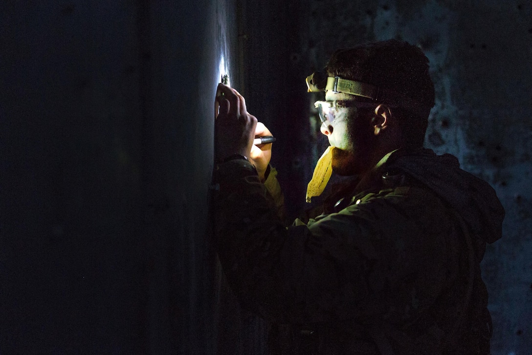 A soldier annotates a medevac report for a simulated casualty during an air assault operation as part of exercise Saber Junction 16 in Grafenwoehr, Germany, April 18, 2016. Army photo by Pfc. Randy Wren