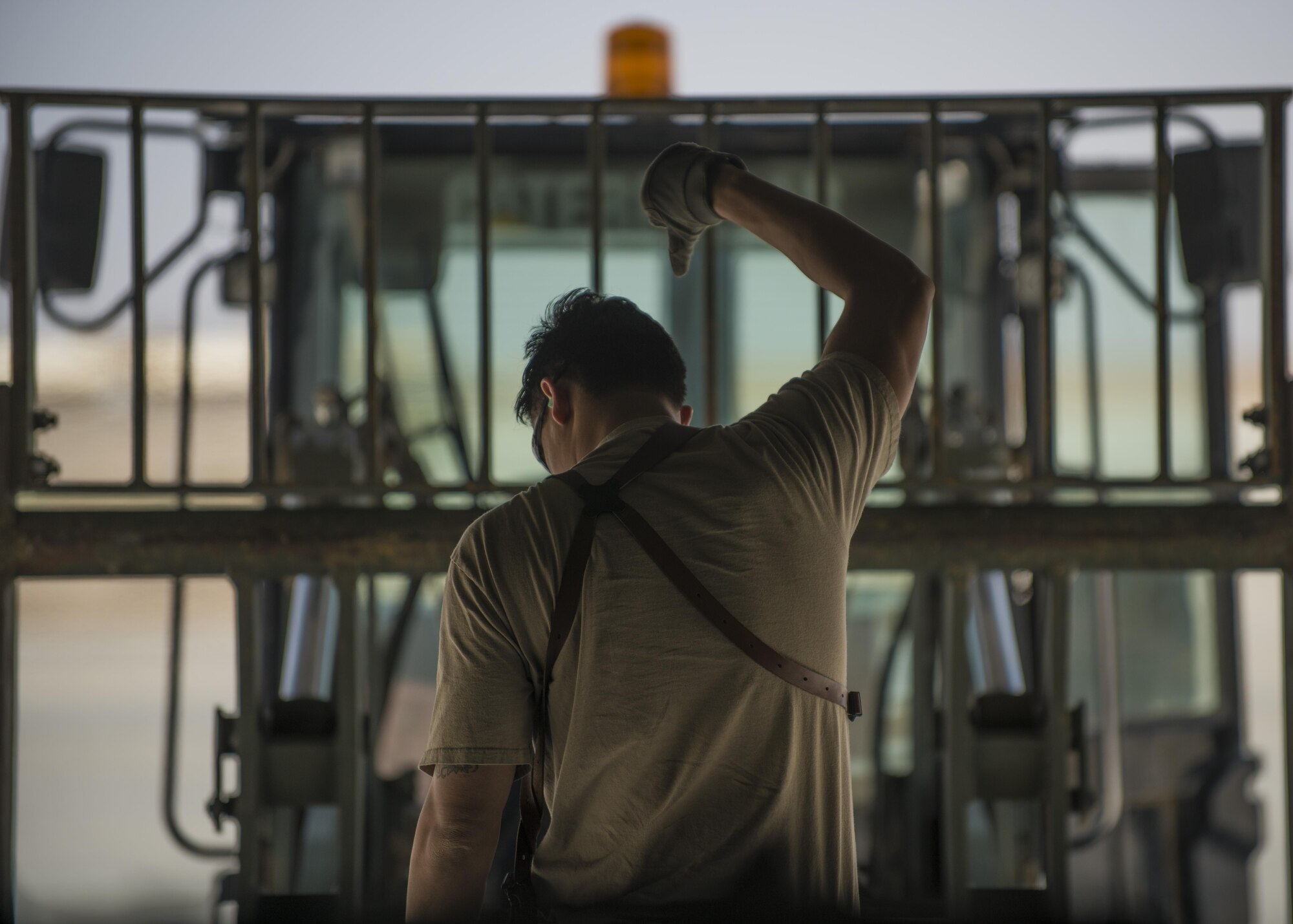 Senior Airman Chris Arnold, 774th Expeditionary Airlift Squadron loadmaster, directs a forklift with cargo to lower onto the ramp of a C-130J Super Hercules at Bagram Airfield, Afghanistan, April 29, 2016. Aircraft loadmasters are responsible for properly loading, securing and escorting cargo and passengers, and ensuring the plane is properly balanced with the weight of the cargo evenly distributed. (U.S. Air Force photo by Senior Airman Justyn M. Freeman)