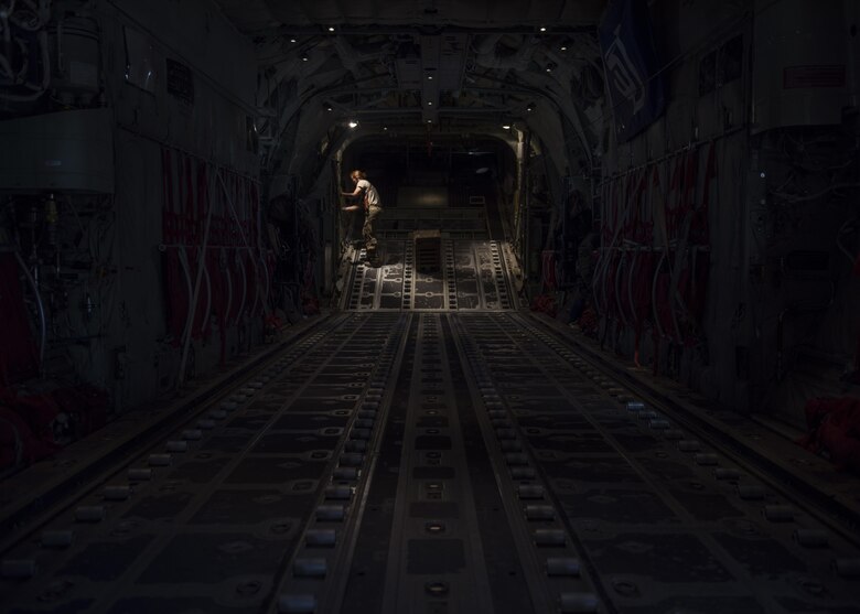 Senior Airman Jessica Jones, 774th Expeditionary Airlift Squadron loadmaster, conducts a pre-flight inspection of a C-130J Super Hercules at Bagram Airfield, Afghanistan, April 29, 2016. As a loadmaster, Jones ensures that cargo and personnel are properly loaded. (U.S. Air Force photo by Senior Airman Justyn M. Freeman)