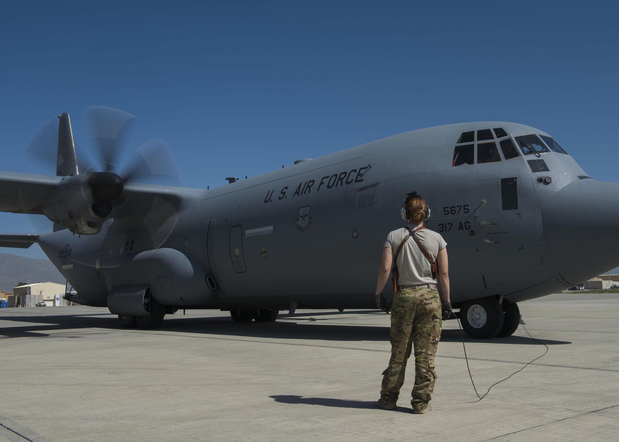 Senior Airman Jessica Jones, 774th Expeditionary Airlift Squadron loadmaster, makes sure the engines are functioning properly during a pre-flight inspection of a C-130J Super Hercules at Bagram Airfield, Afghanistan, April 29, 2016. Members of the 774th EAS deliver cargo and personnel throughout Afghanistan in support of Operation Freedom's Sentinel and NATO's Resolute Support Mission. (U.S. Air Force photo by Senior Airman Justyn M. Freeman)