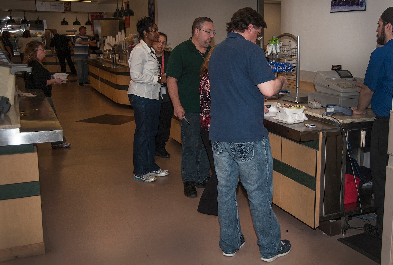 Land and Maritime associates show their support for Denim Day as they grab a quick lunch at the Building 20 cafeteria. 