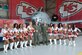 Col. Greg Eckfeld (left) and Col. Brian Borgen, vice commander and commander of the 442d Fighter Wing respectively, meet with the Kansas City Chiefs cheerleaders during the Military Appreciation Day event at Whiteman Air Force Base, Mo., April 30, 2016. Service members and their families enjoyed photo-ops and autographs with the Chiefs cheerleaders and players, among other activities. (U.S. Air Force photo by Airman 1st Class Missy Sterling/Released)