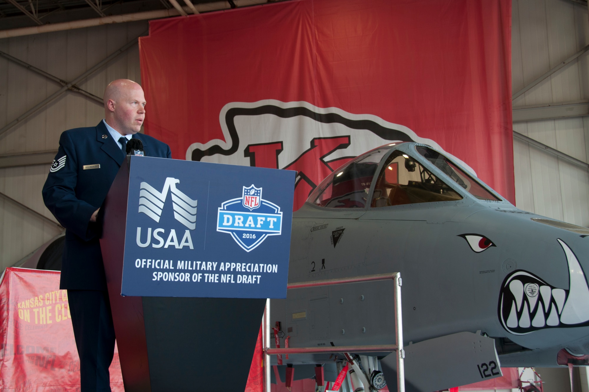 Tech. Sgt. Jason Billingsley, services specialist assigned to the 442d Fighter Wing, was one of the few service members chosen to announce a draft pick for the Kansas City Chiefs during the Military Appreciation Day event at Whiteman Air Force Base, Mo., April 30, 2016. Billingsley announced the 203rd pick, Dadi Nicholas from Virginia Tech. (U.S. Air Force photo by Airman 1st Class Missy Sterling/Released)