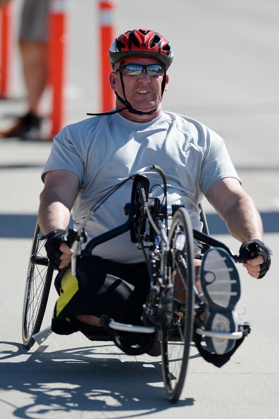 Army 1st Lt. Christopher Parks competes in the men's hand cycle event during the Army trials at Fort Bliss, Texas, March 29, 2015. He overcame a rare illness to make the team and will compete at the Invictus Games held May 8-12 in Orlando, Fla. DoD photo by EJ Hersom