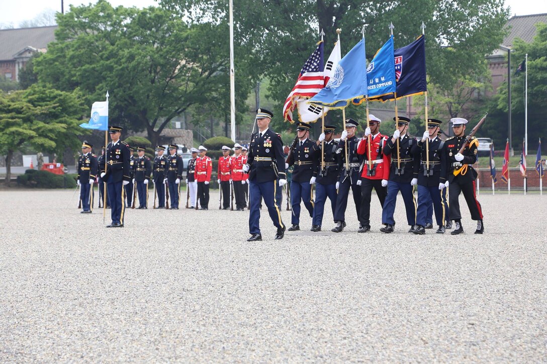 The United Nations Command Honor Guard presents the colors during the U.S. Forces Korea change-of-command ceremony at Yongsan Garrison, South Korea, April 30, 2016. Army photo by Sgt. Russell Youmans