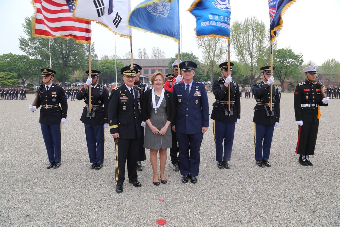 Army Gen. Curtis M. Scaparrotti, front left, outgoing commander of U.S. Forces Korea, and his wife, Cindy, stand with Air Force Gen. Paul J. Selva, vice chairman of the Joint Chiefs of Staff, after being recognized for their hard work and commitment during a change-of-command ceremony at Yongsan Garrison, South Korea, April 30, 2016. Army photo by Sgt. Russell Youmans