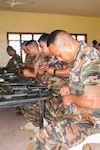 Member of His Majesty’s Armed Forces of Tonga participate in a weapons maintenance information-sharing session led by Nevada Guard Soldiers and Airmen in Tonga last week. The Nevada National Guard and the Tongan military are teamed in the National Guard's State Partnership Program.
