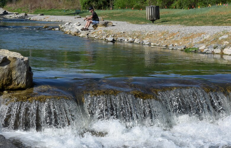 Gary Hensley of Elizabethtown, Ky., fishes in Hatchery Creek in Jamestown, Ky., April 29, 2016 just below the Wolf Creek National Fish Hatchery. U.S. Army Corps of Engineers Nashville District officials participated in the dedication of the stream restoration later the same day.