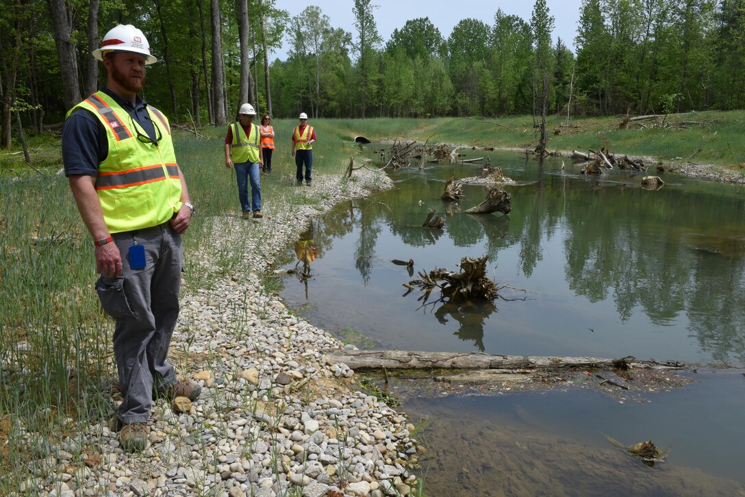 U.S. Army Corps of Engineers Nashville District employees check out a section of Hatchery Creek below Wolf Creek National Fish Hatchery April 29, 2016.  They toured the Hatchery Creek Restoration Project site just prior to the dedication ceremony. 