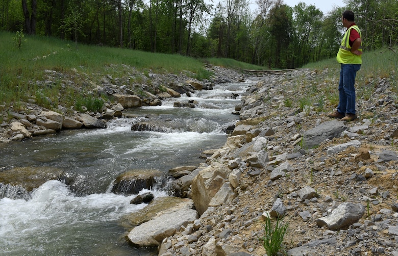 Doug DeLong, Hatchery Creek Restoration Project manager, looks at the lower section of the stream April 29, 2016 prior to the dedication ceremony.  The stream’s elevation drops 30 feet through a series of steep pools in the final 150 yards before it empties into the Cumberland River.