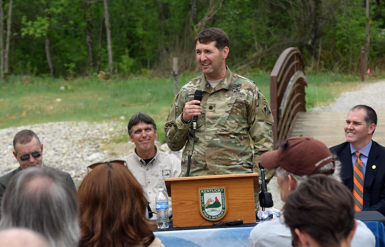 Lt. Col. Stephen Murphy, U.S. Army Corps of Engineers Nashville District commander, speaks during the Hatchery Creek Dedication in Jamestown, Ky., April 29, 2016.  He talked about how the Hatchery Creek Restoration Project gave the Corps of Engineers enough top soil to cover a 40-acre disposal area filled with limestone rock, concrete and clay from the Wolf Creek Dam Safety Rehabilitation Project.  The Corps spent $650,000 to excavate the soil, but used about 56,000 cubic yards of top soil excavated from the channel with savings of almost a million dollars.