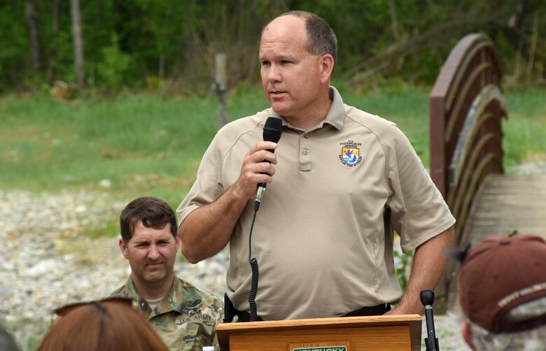 James Gray, Wolf Creek National Fish Hatchery manager, speaks during the Hatchery Creek Restoration Project Dedication in Jamestown, Ky., April 29, 2016. He said the project is the culmination of decades of talking about it, identifying funding solutions, and then agencies and private contractors partnering and working through the technical obstacles to make the stream a reality.