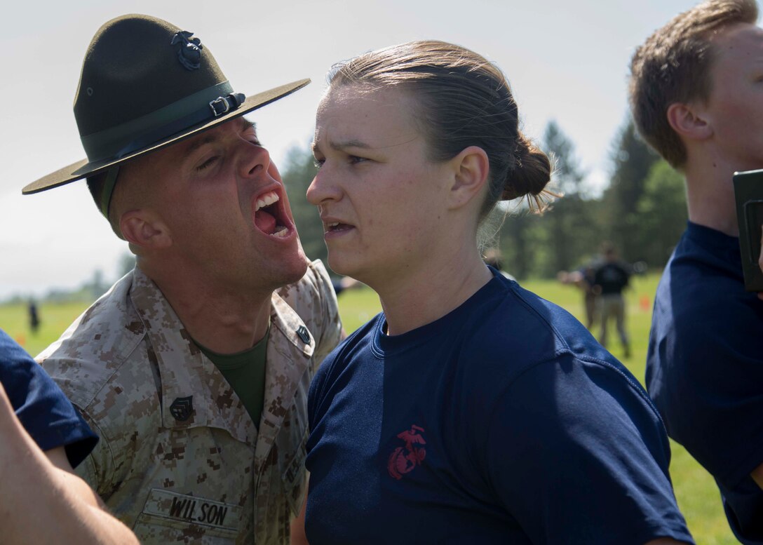 Senior Drill Instructor, Staff Sgt Trevon Wilson, encourages a poolee at the Recruiting Station Portland Aunnual pool function aboard Camp Rilea, Warrenton, Oregon. Poolees were given an oppurtunity during a 3-day training event to experience aspects of recruit training to include the presence of drill instructors and physical training.(U.S. Marine Corps photo by Sgt. Taylor Morton)