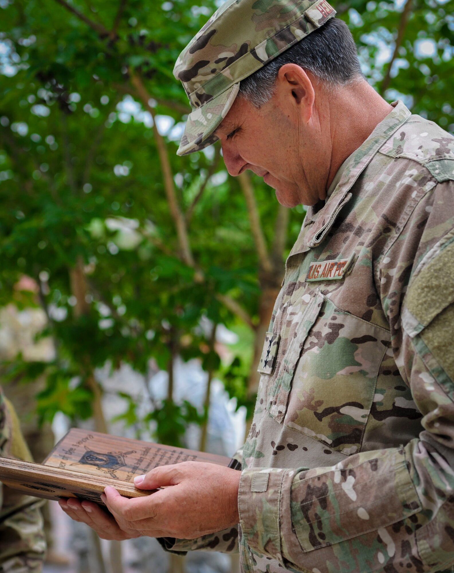 Lt. Gen. Brad Heithold, the commander of Air Force Special Operations Command, contemplates his Order of the Sword invitation at Hurlburt Field, Fla., May 2, 2016. His induction -- bestowed by enlisted Air Commandos -- will be formalized at a ceremony Nov. 18, 2016. The Order of the Sword draws its heritage from military tradition where non-commissioned officers honor leaders who have made significant contributions to the enlisted corps. (U.S. Air Force photo by Senior Airman Meagan Schutter)