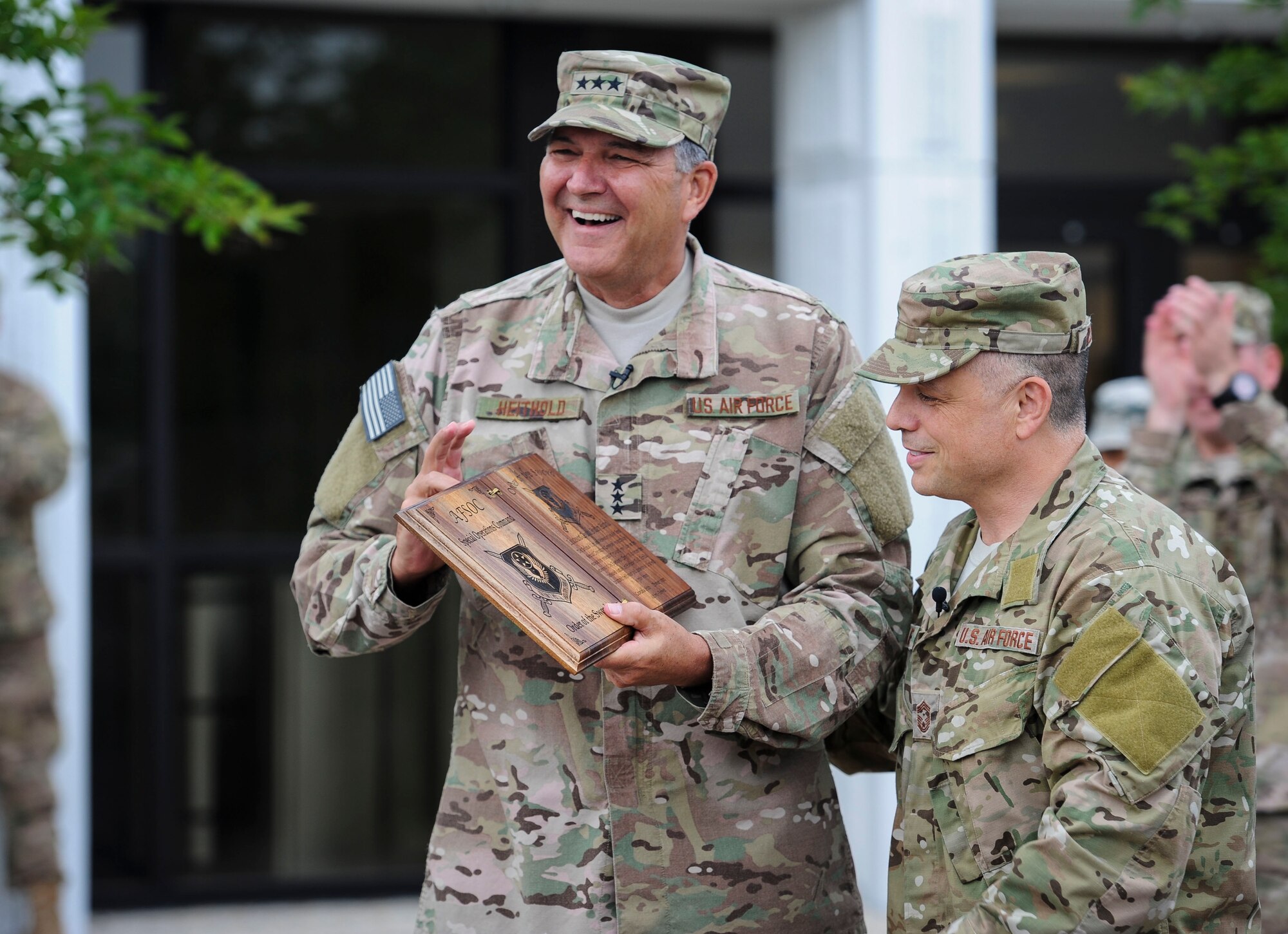 Lt. Gen. Brad Heithold, commander of Air Force Special Operations Command, accepts his Order of the Sword invitation from Chief Master Sgt. Matt Caruso, AFSOC command chief, at Hurlburt Field, Fla., May 2, 2016. The Order of the Sword is the highest award the enlisted corps can bestow upon an officer, draws its heritage from military tradition where non-commissioned officers honor leaders who have made significant contributions to the enlisted corps. Heithold will be inducted Nov. 18, 2016 here. (U.S. Air Force photo by Senior Airman Meagan Schutter)