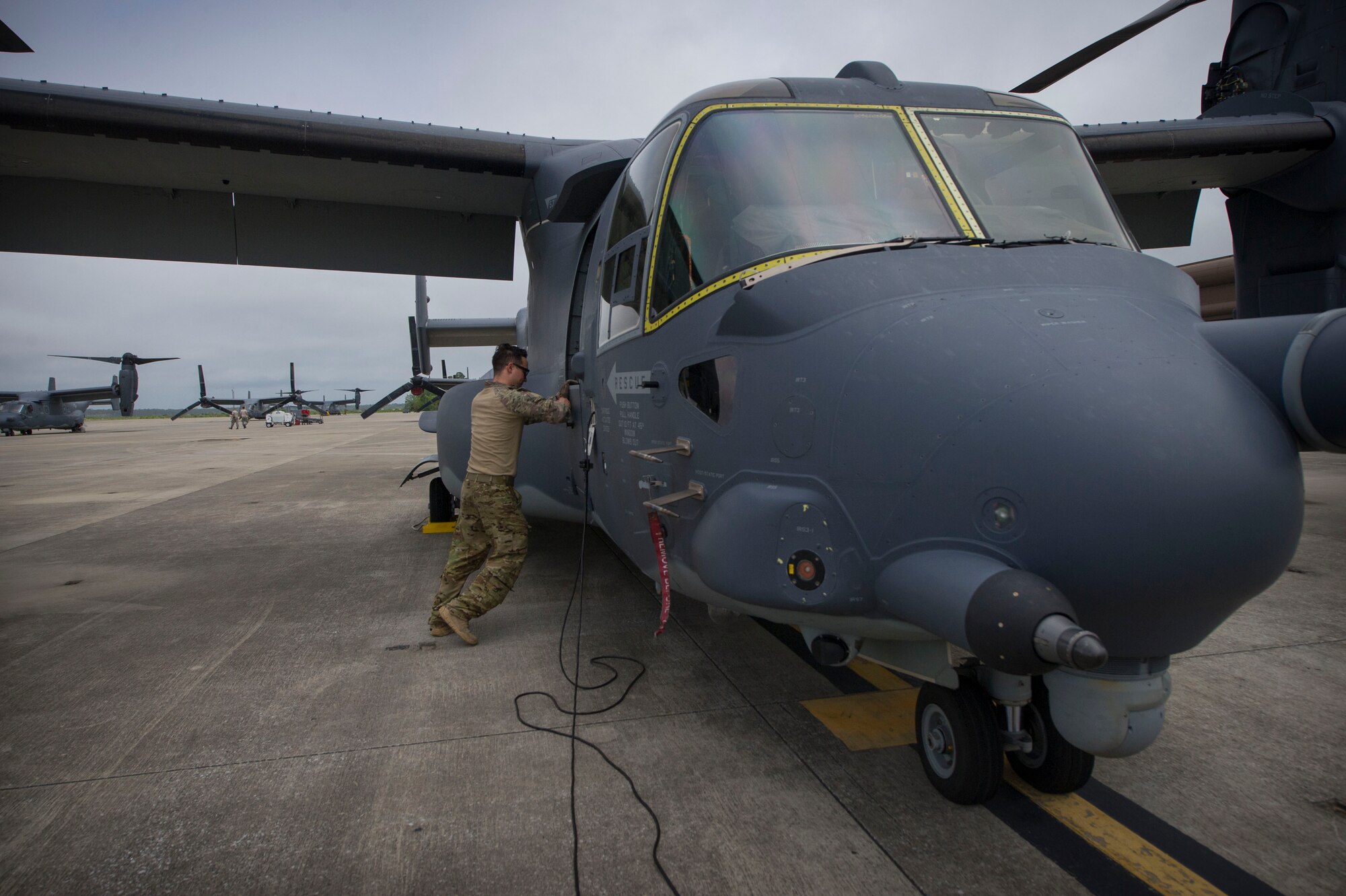 Staff Sgt. Samuel Levander, a flight engineer with the 8th Special Operations Squadron, performs a pre-flight inspection on a CV-22 Osprey at Hurlburt Field, Fla., April 27, 2016. Pre-flight inspections are done to check for any issues that may interfere with the flight mission.  (U.S. Air Force photo by Senior Airman Krystal M. Garrett) 