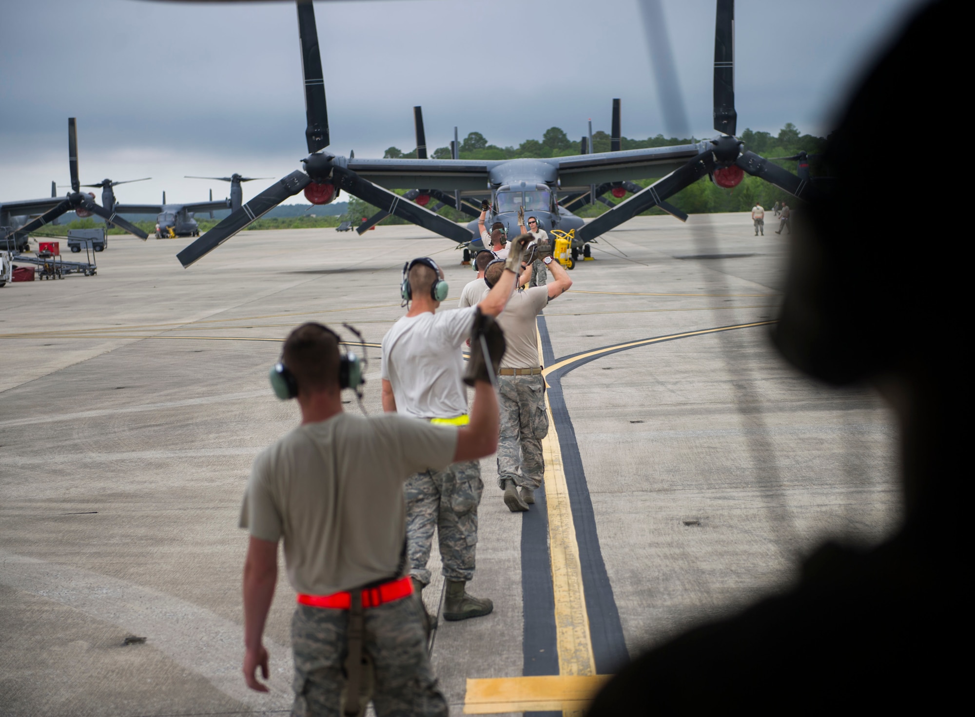 Airmen with the 801st Aircraft Maintenance Squadron, perform a functional check of CV-22 Osprey equipment during a pre-flight inspection at Hurlburt Field, Fla., April 27, 2016. Pre-flight inspections are done to check for any issues that may interfere with the flight mission. (U.S. Air Force photo by Senior Airman Krystal M. Garrett) 
